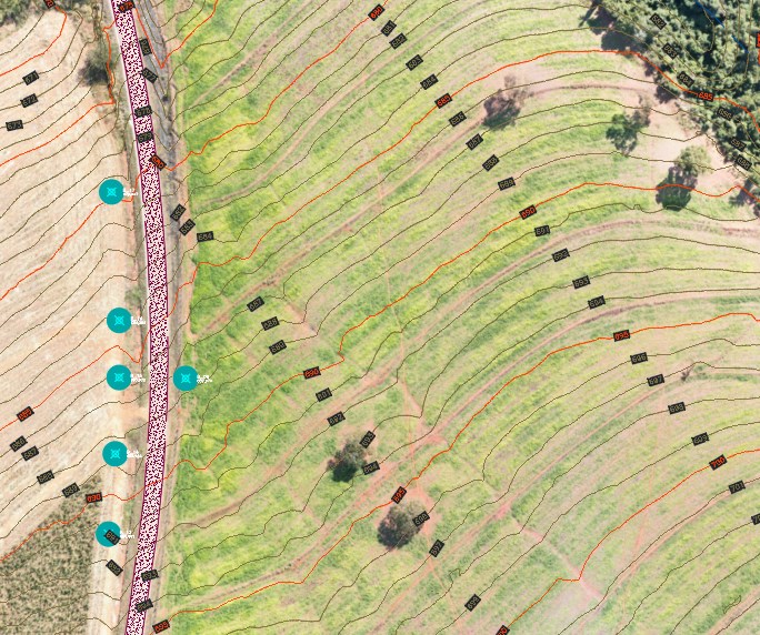 Curvas de nível extraídas do modelo de elevação, com vetorização de vias e construções